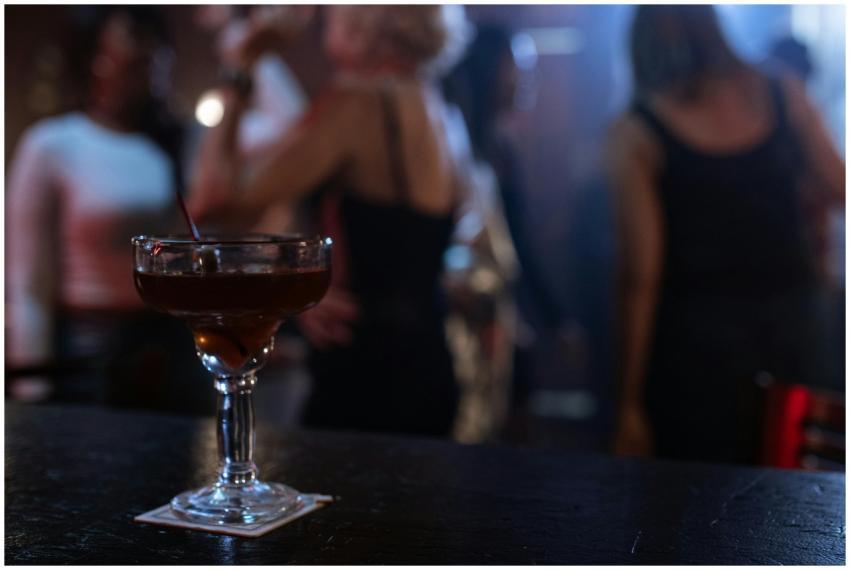 A lively nightclub atmosphere with focus on a cock