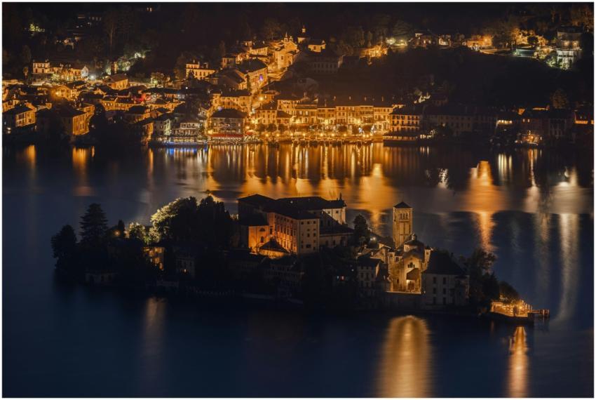 A breathtaking night view of Lake Orta reflecting