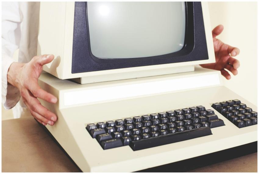 A vintage computer with a classic CRT monitor and