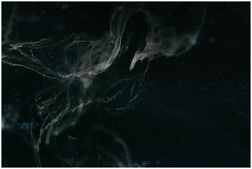 Abstract dark nebula image with swirling patterns