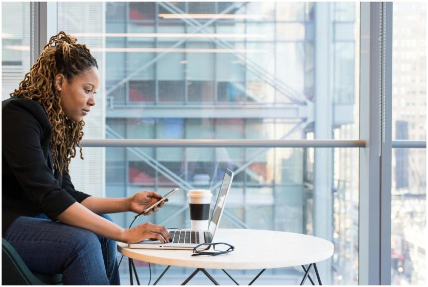 African American woman working remotely with a lap