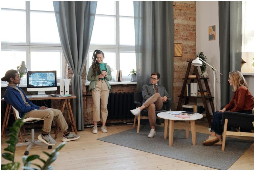 A group of adults collaborating in a modern office