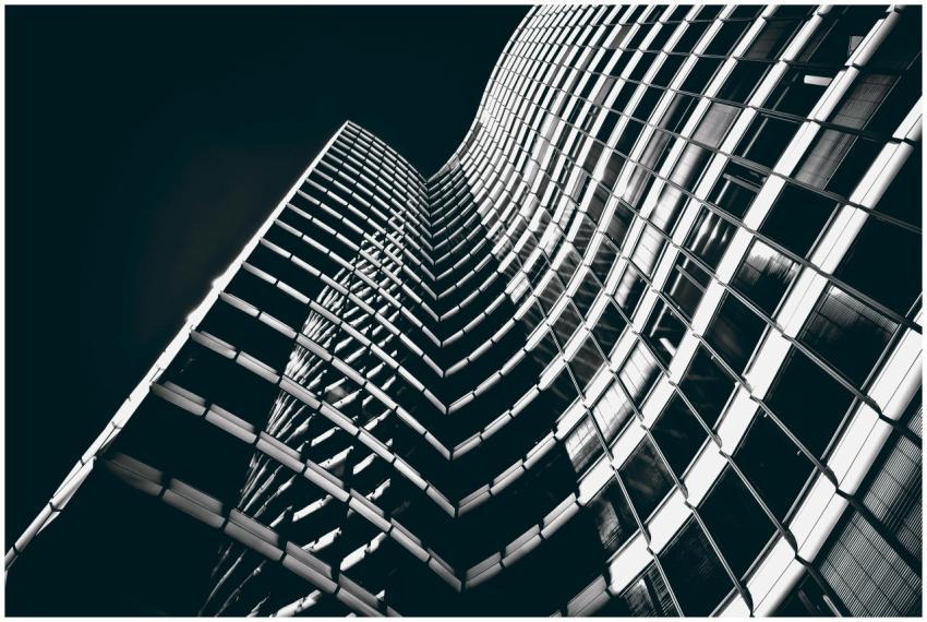 Curvaceous modern skyscraper facade in black and w