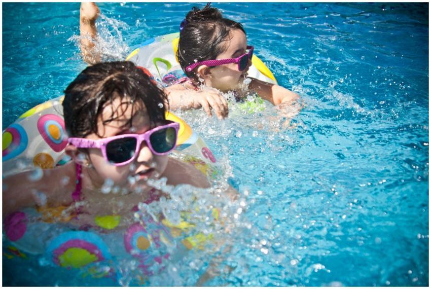 Two young girls enjoying a playful day in a bright
