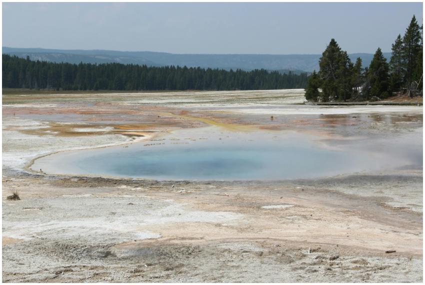 Scenic view of a geothermal pool in Yellowstone Na
