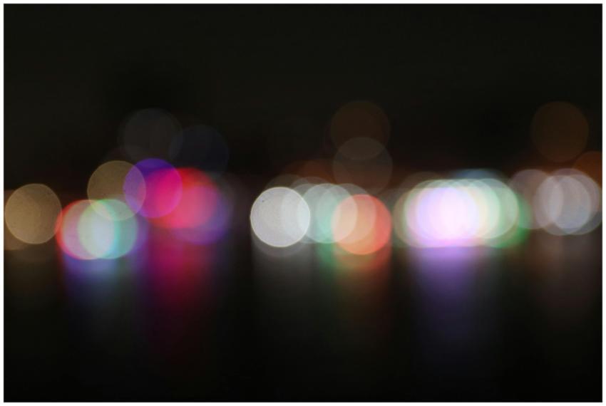 Vibrant and colorful bokeh lights defocused agains