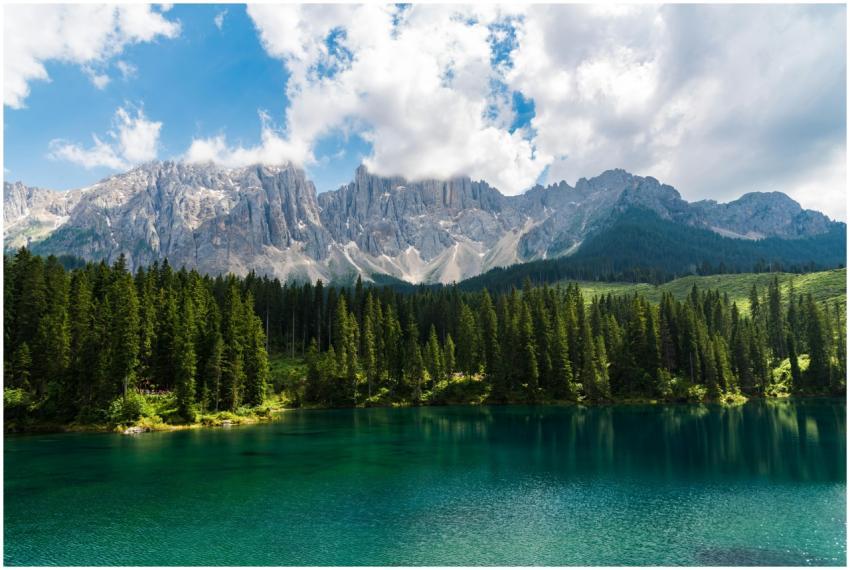 Breathtaking view of emerald lake surrounded by Do
