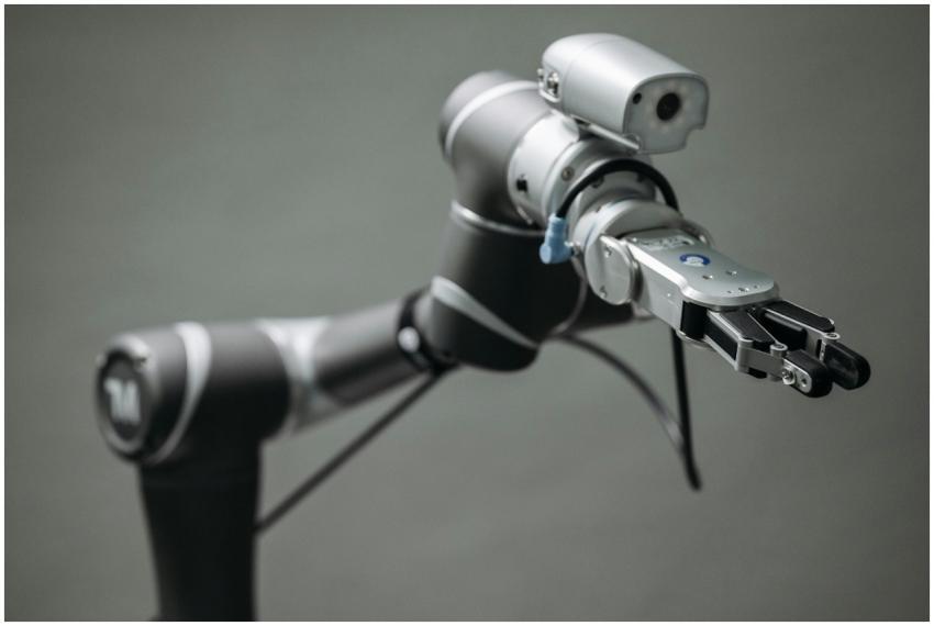 Close-up view of a robotic arm equipped with a vid