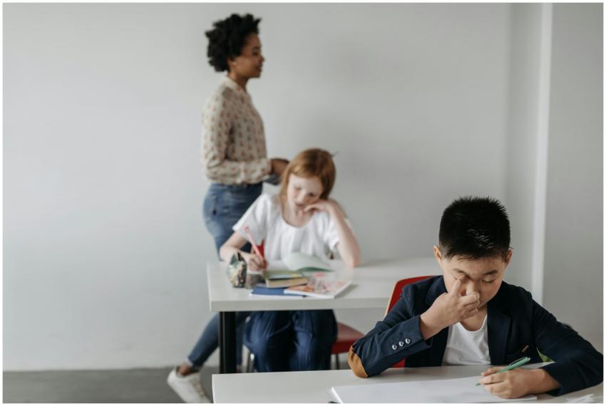 Focused classroom scene with students studying und