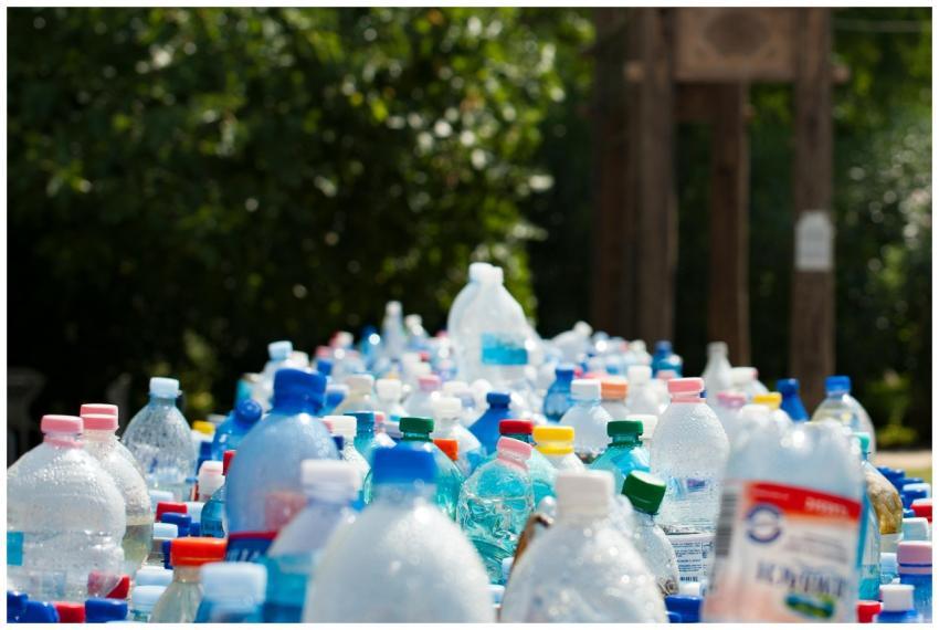 A vibrant collection of plastic bottles in an outd