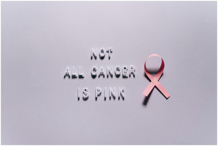 Pink ribbon highlighting diverse cancer awareness