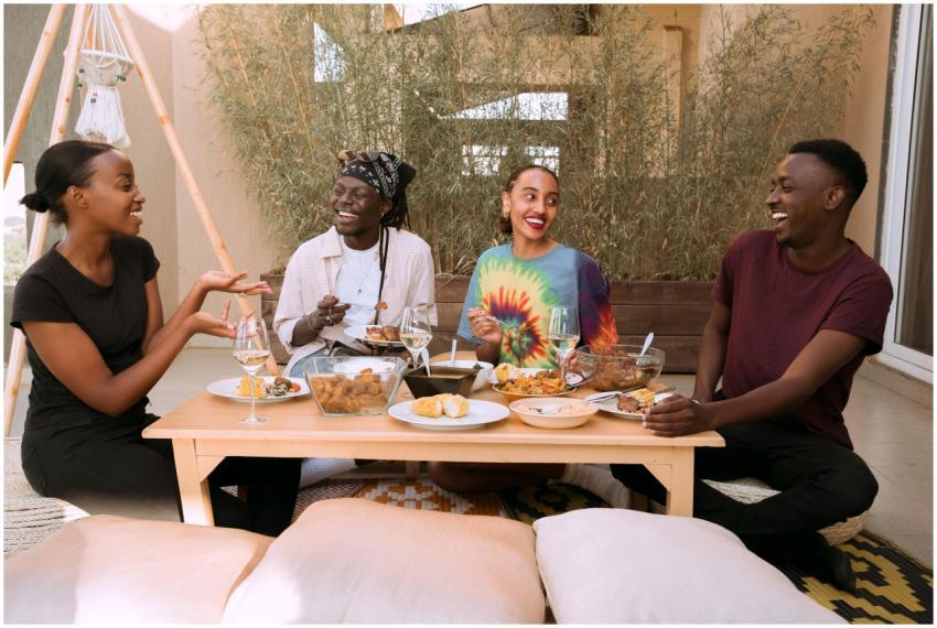 A cheerful group of friends bonding over a meal ou