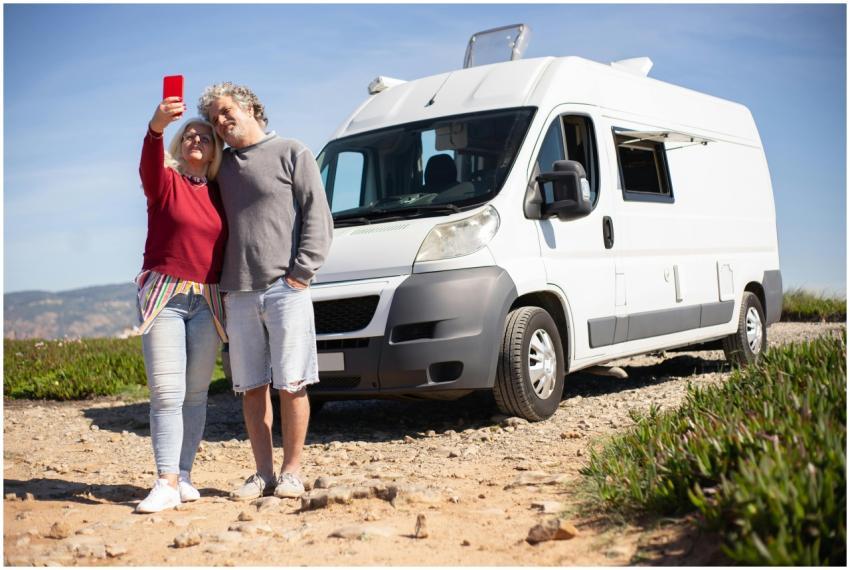 Senior couple enjoying a road trip in Portugal, ca