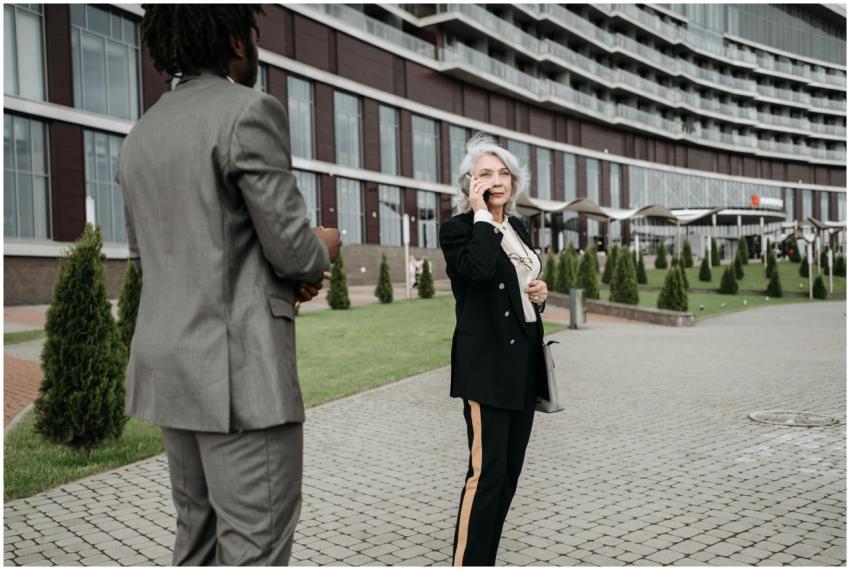 Two business professionals in outdoor urban settin