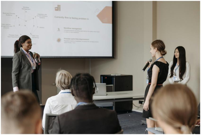 Corporate conference scene with women presenting a