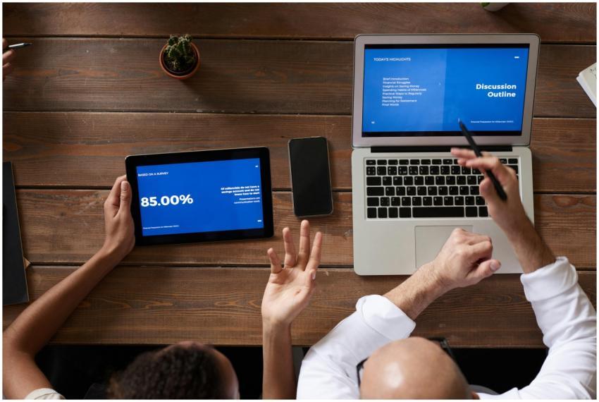 Overhead view of professionals collaborating on di