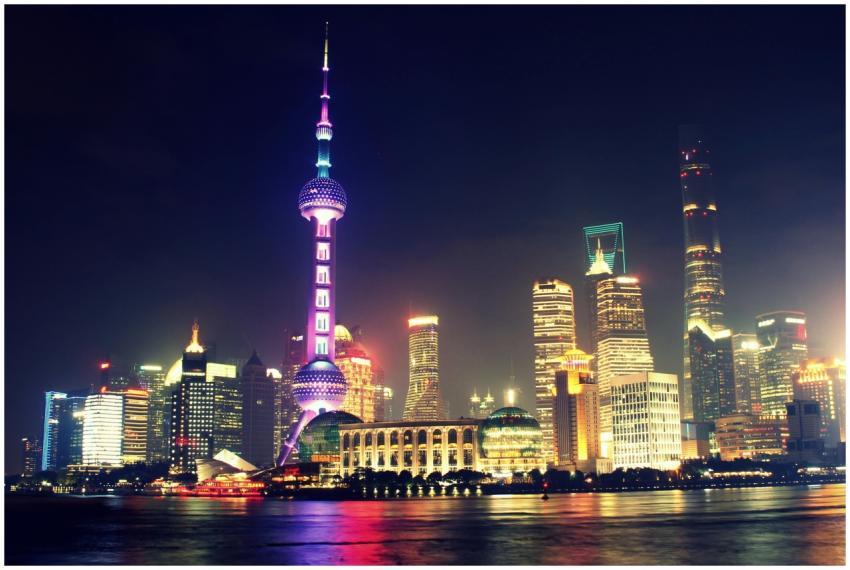 Vibrant nighttime view of Shanghai's iconic skylin