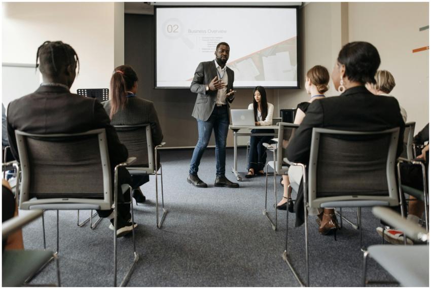 Diverse group attending a business seminar with a