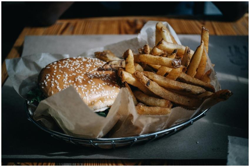 A tempting burger with sesame seed bun and crispy