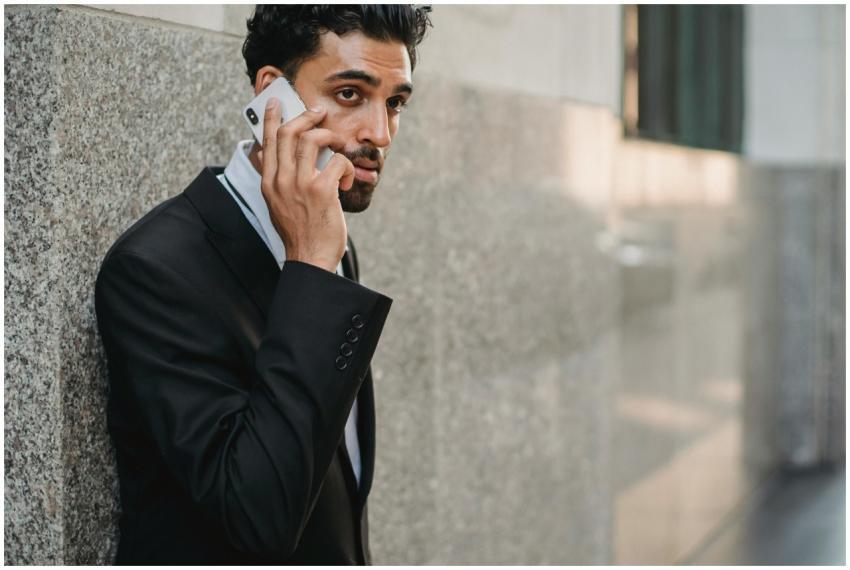 Professional businessman in a suit having a phone