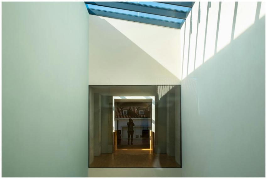 Modern architectural space with skylight and refle