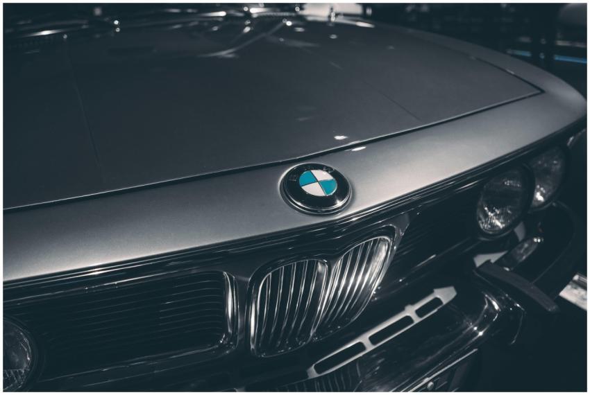 Close-up of classic BMW hood showcasing emblem and