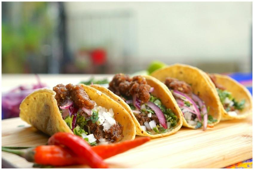 Close-up of tasty beef tacos with onions and cilan