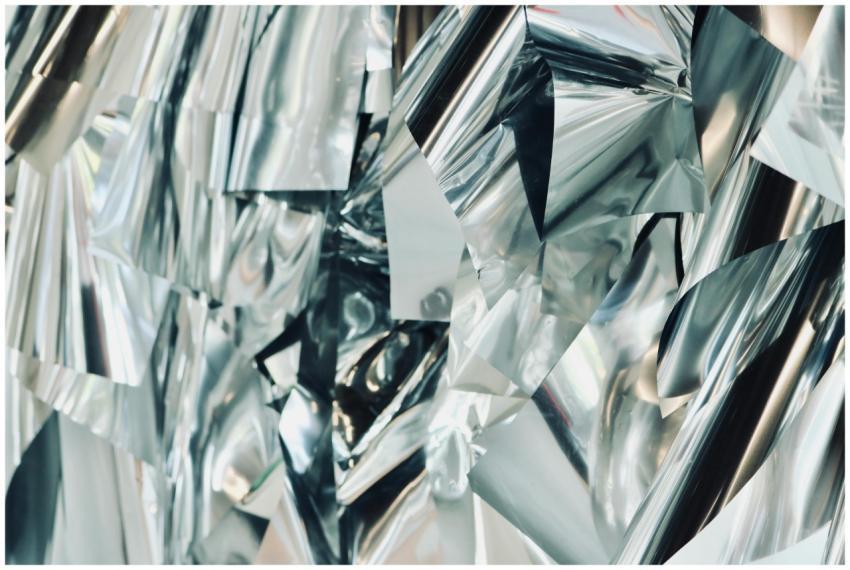 Close-up view of a shiny, abstract metallic surfac