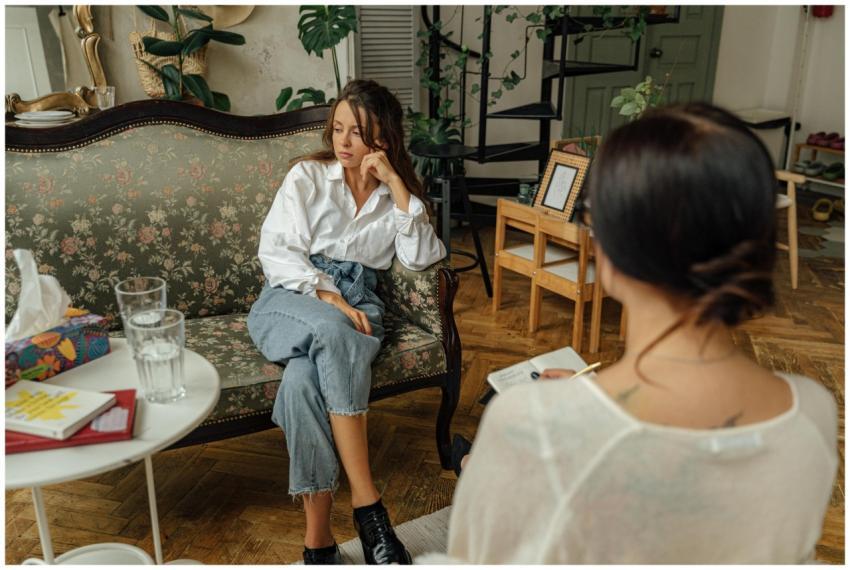 A thoughtful counseling session between a psycholo