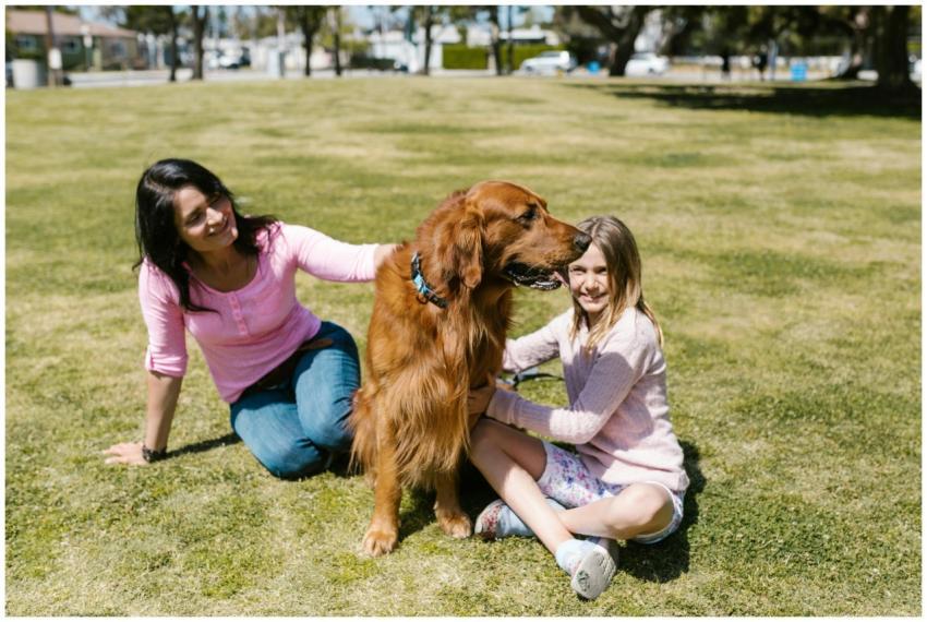 A woman and child enjoy a sunny day outdoors with