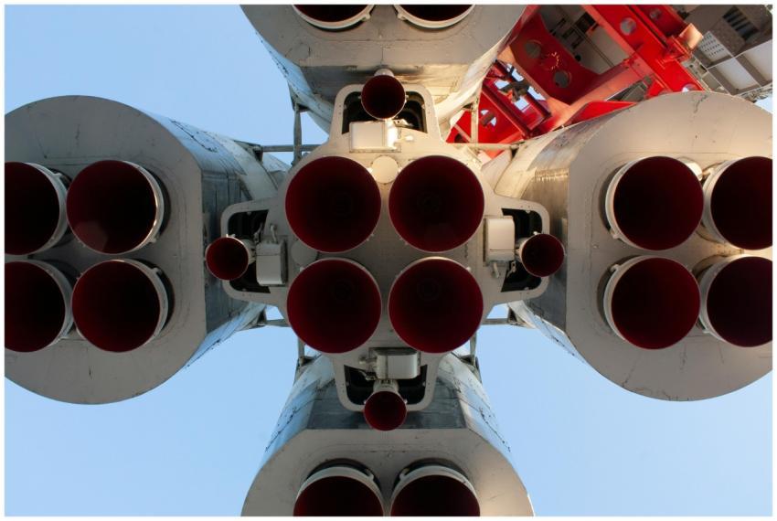 Dramatic close-up view of rocket engines, emphasiz