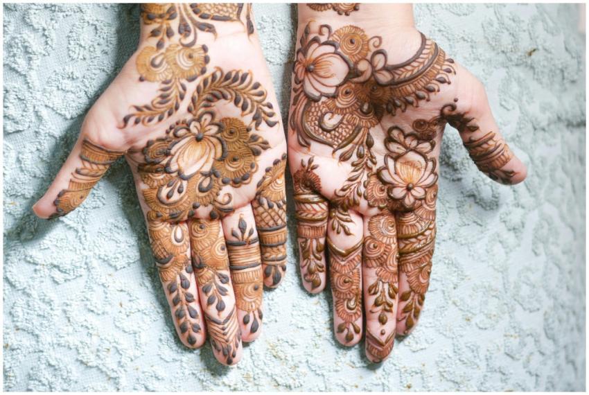 Beautifully detailed henna mehndi designs on both