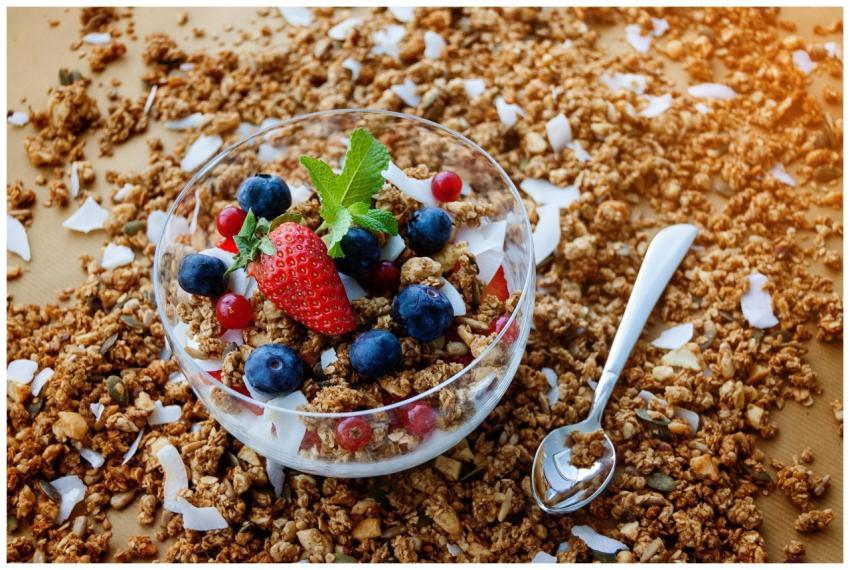 A top view of a healthy granola breakfast with fre