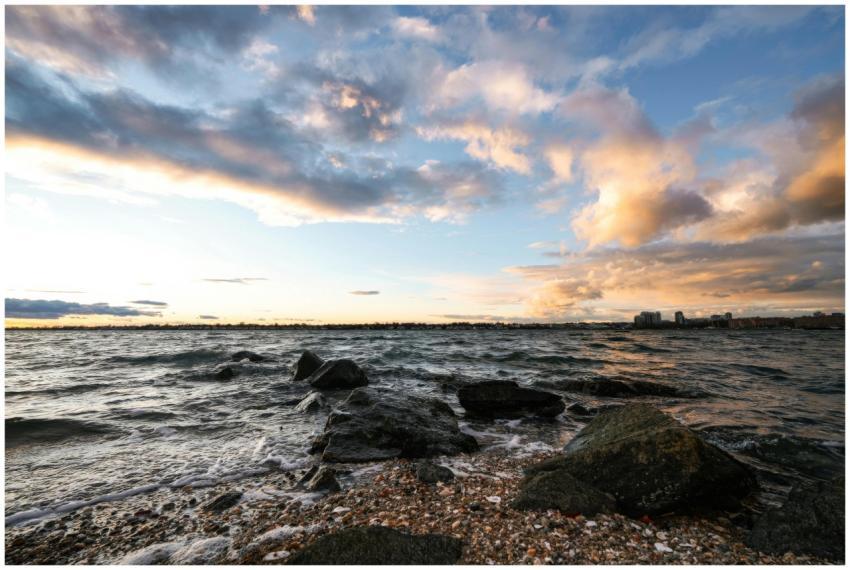 A breathtaking sunset view over a rocky coastline