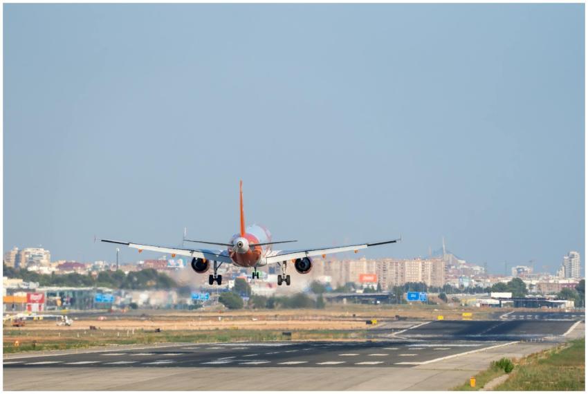 Airplane approaching runway at Manises Airport in