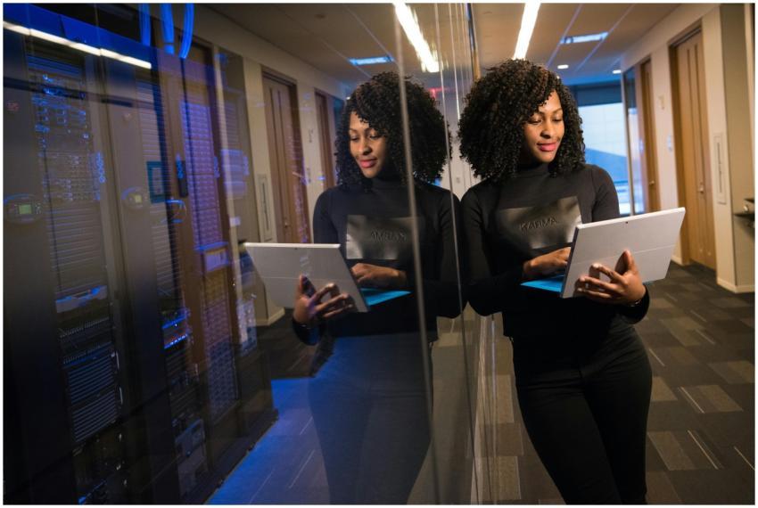 African American woman standing in modern office u