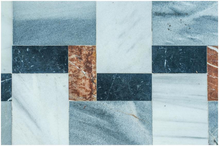 Close-up of a geometric marble tile pattern with n