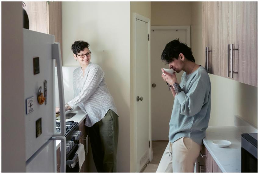 Two people enjoying a relaxed morning in a bright