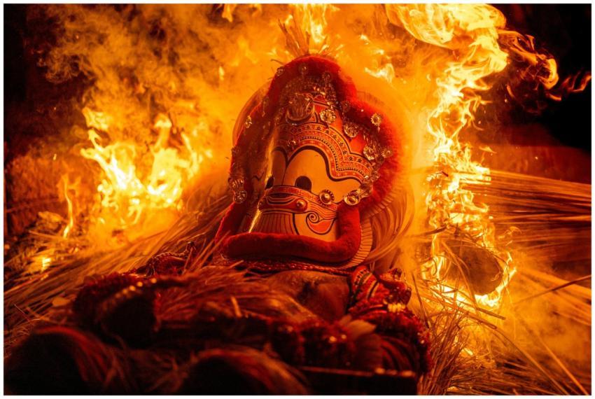 Captivating night photo of a colorful Theyyam ritu