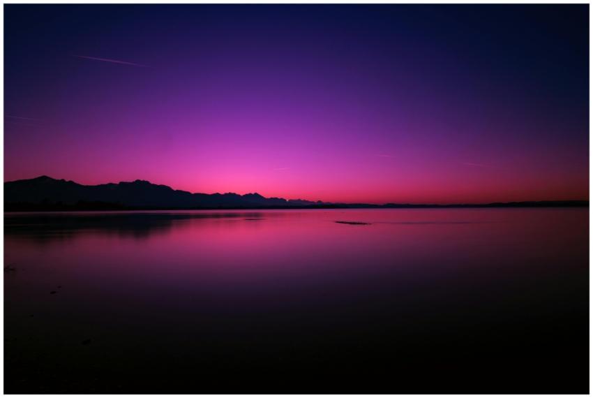 Breathtaking sunset over Chiemsee with vivid color
