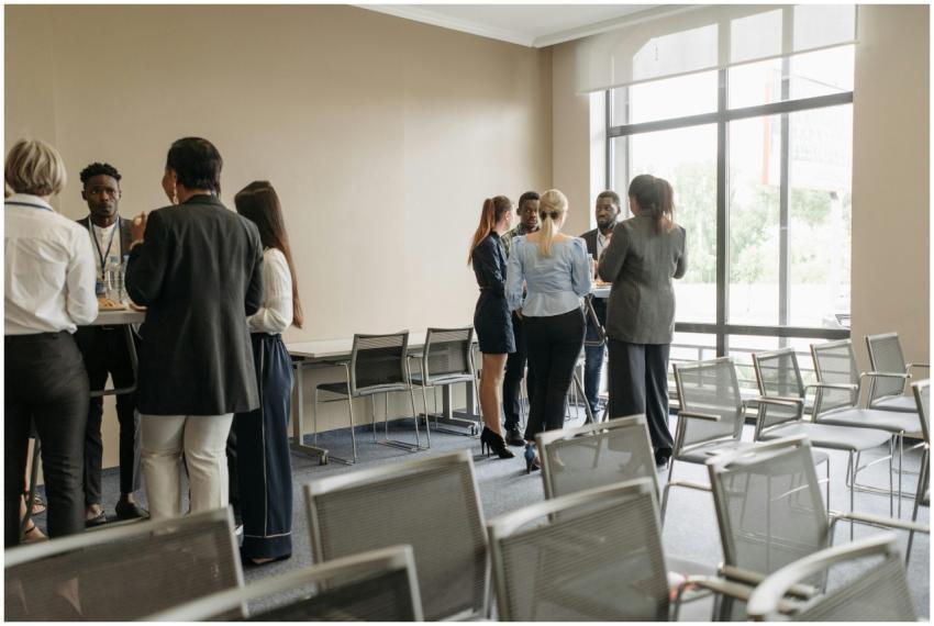 Professionals engaging in a casual networking sess