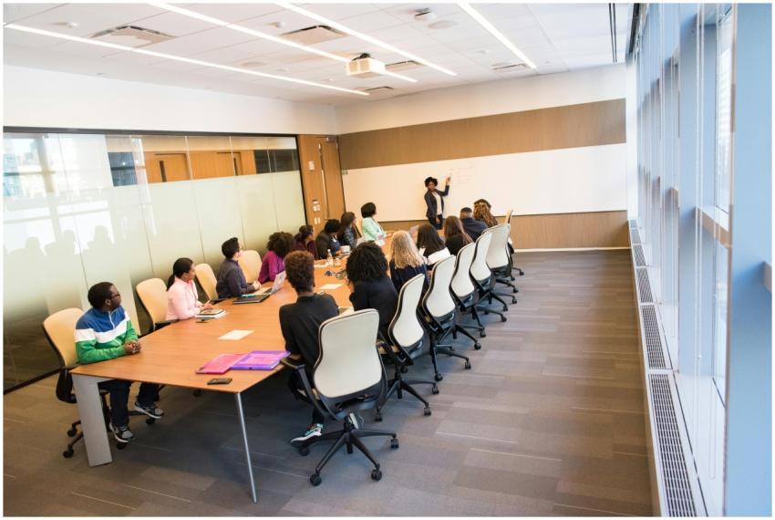 A diverse group actively collaborating in a bright