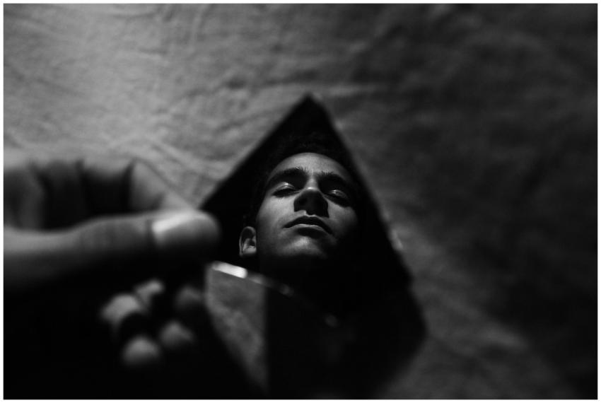 A moody black and white portrait reflection captur