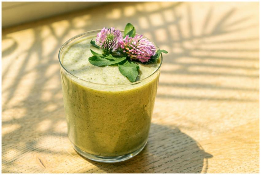 Close-up of a nutritious green smoothie topped wit