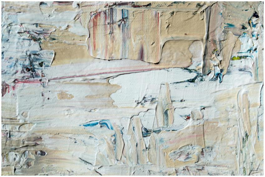 Close-up of textured abstract painting with layere