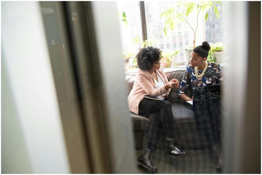 Two women having a business meeting in a modern of