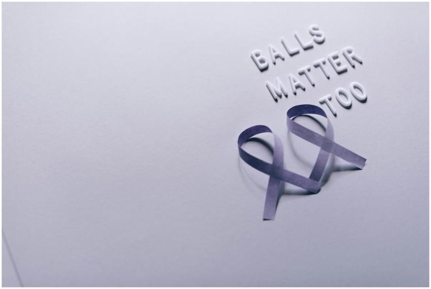 Purple ribbons and text promoting testicular cance