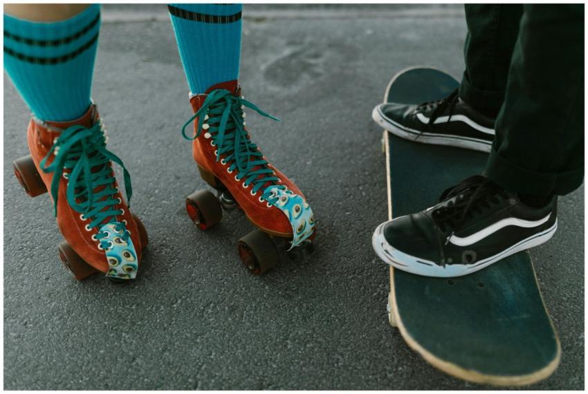 Close-up of colorful roller skates and skateboard