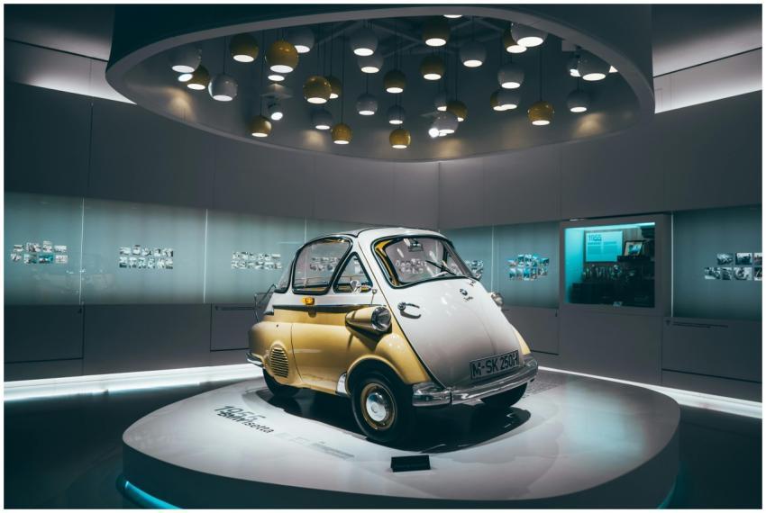 A classic microcar showcased in a modern, illumina