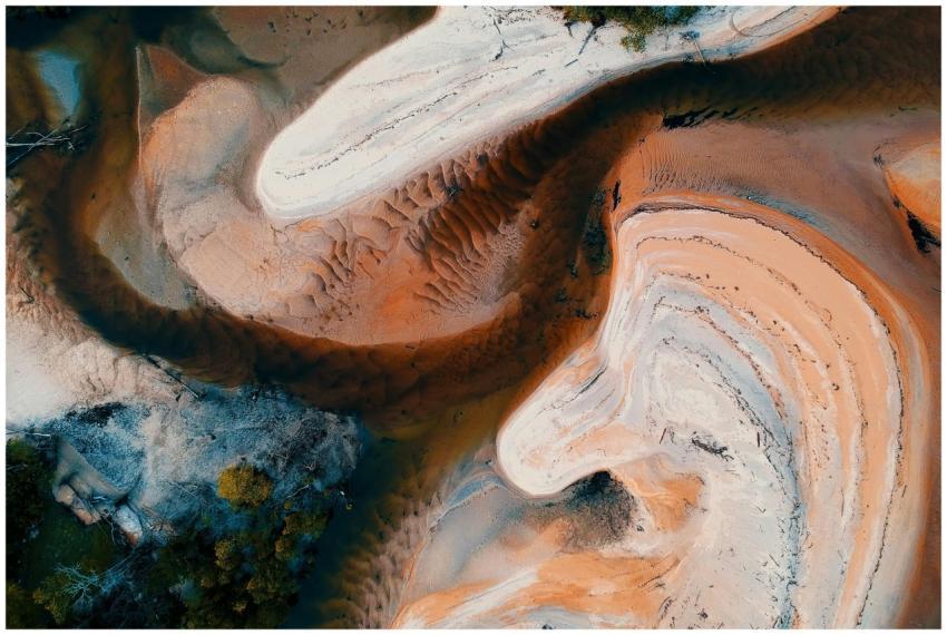 Aerial view showcasing abstract sand patterns and